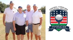 Four man golf team with foundation golf tournament logo