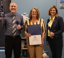 Christi McElveen standing with VP Academics Jason Tisdel and CCTC President Dr. Wilbanks