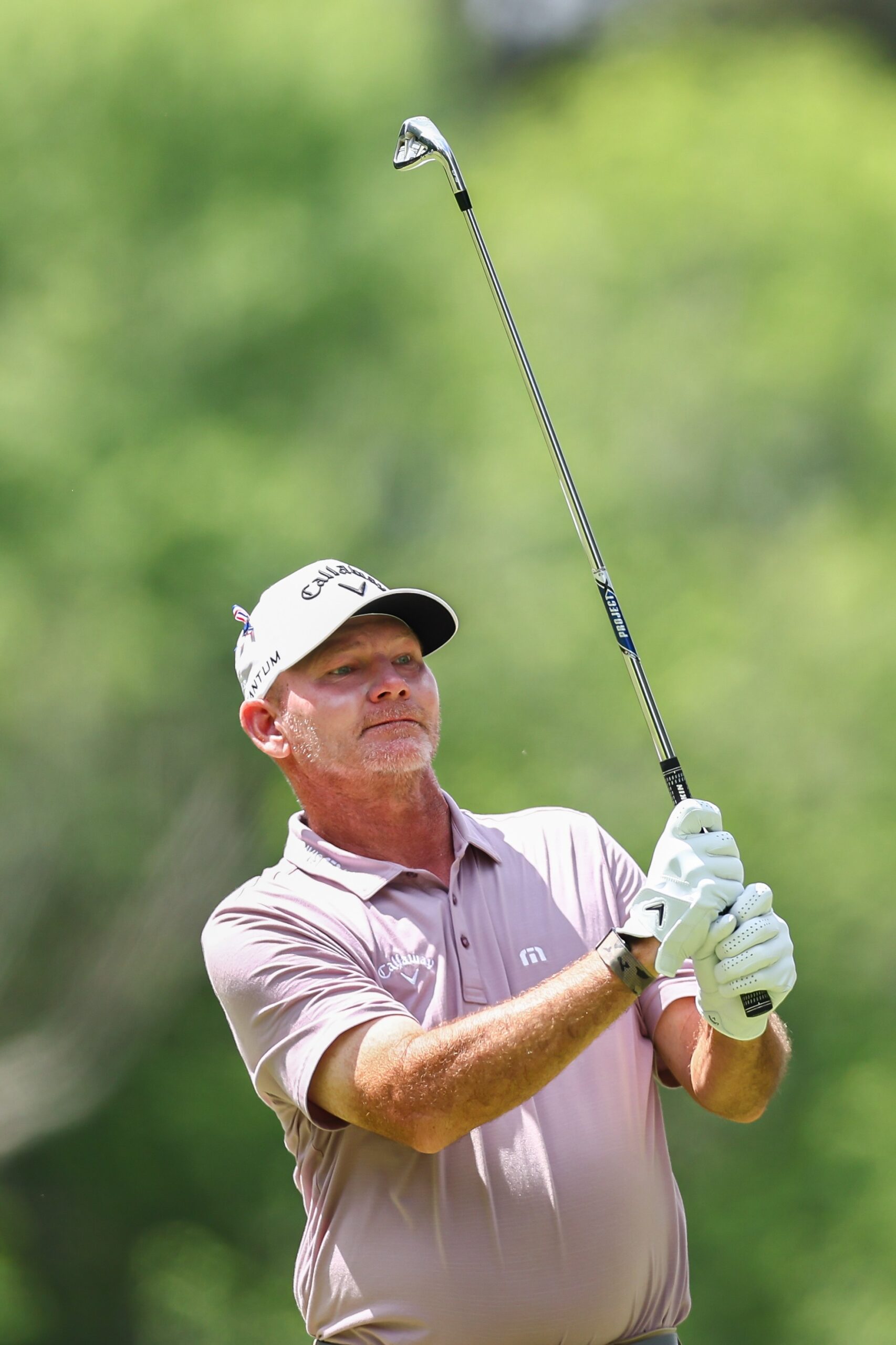 Tommy Gainey, male, swinging a golf club